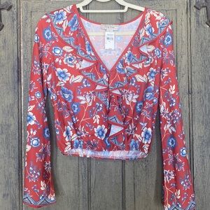 Burnt Orange/Red Boho crop top with front ruffle and full-length bell sleeves